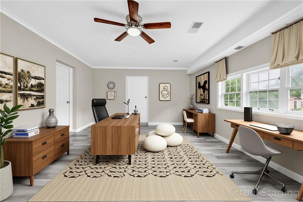 305 South 18th Street Griffin, GA 30224 - Photo 5 of 36 a living room with furniture and a window