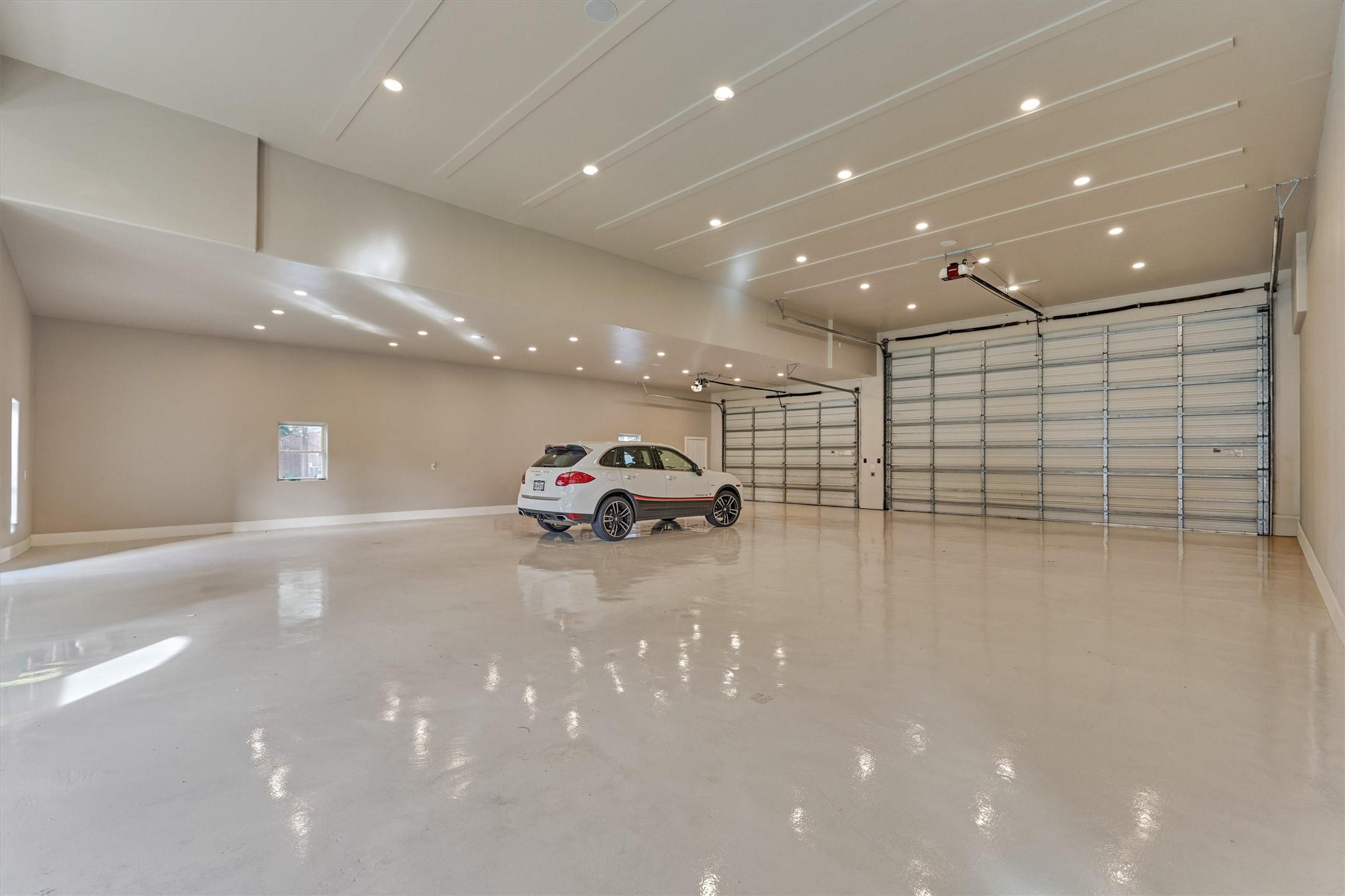 1907 Woerner Road Houston, TX 77090 - Photo 45 of 50 Super sized garage space with room for 15 vehicles. The RV bay can hold 2- 45 ft RVS. A showcase home with a showroom for your toys!