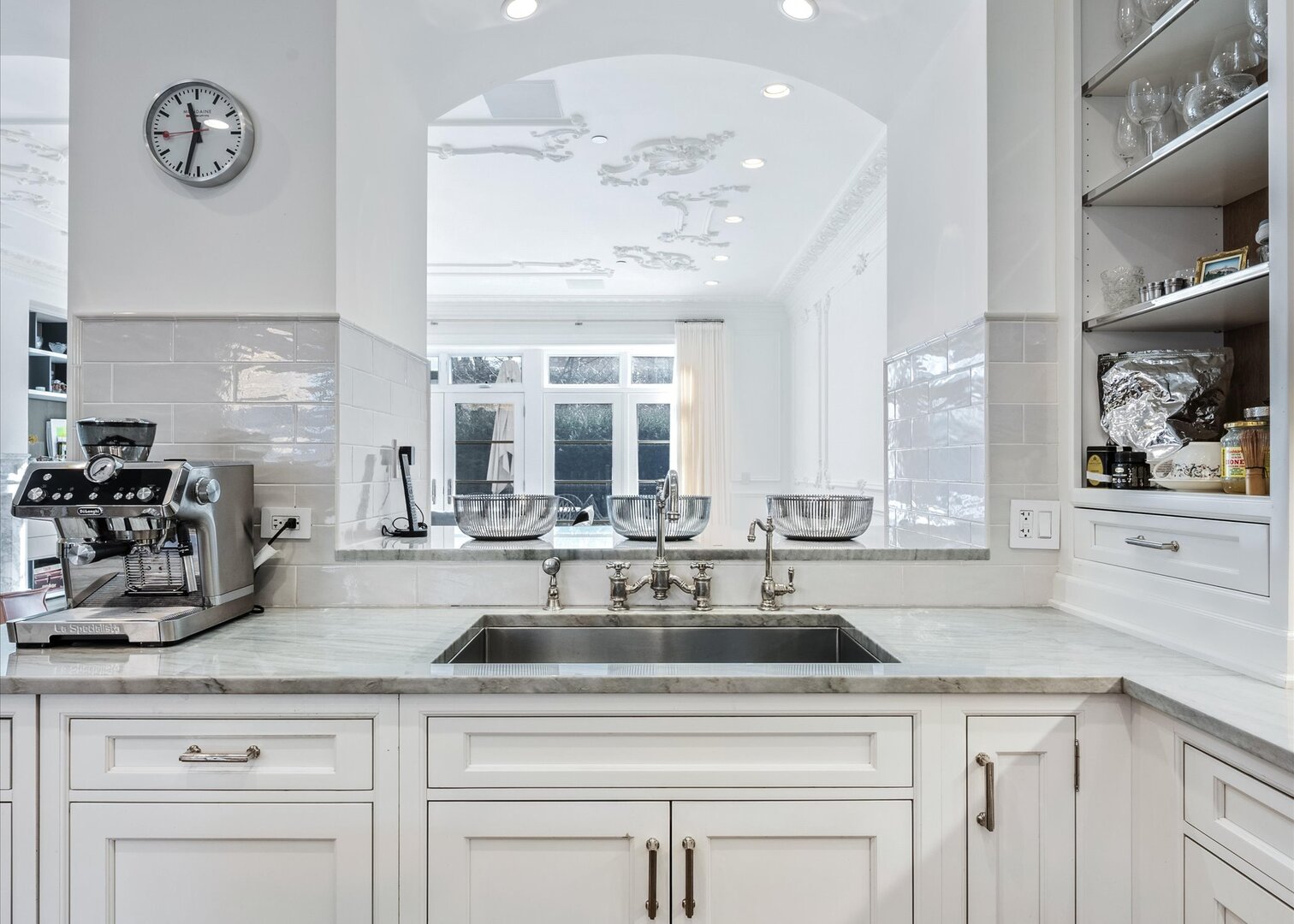 441 West Deming Place Chicago, IL 60614 - Photo 11 of 54 a kitchen with sink a clock and cabinets