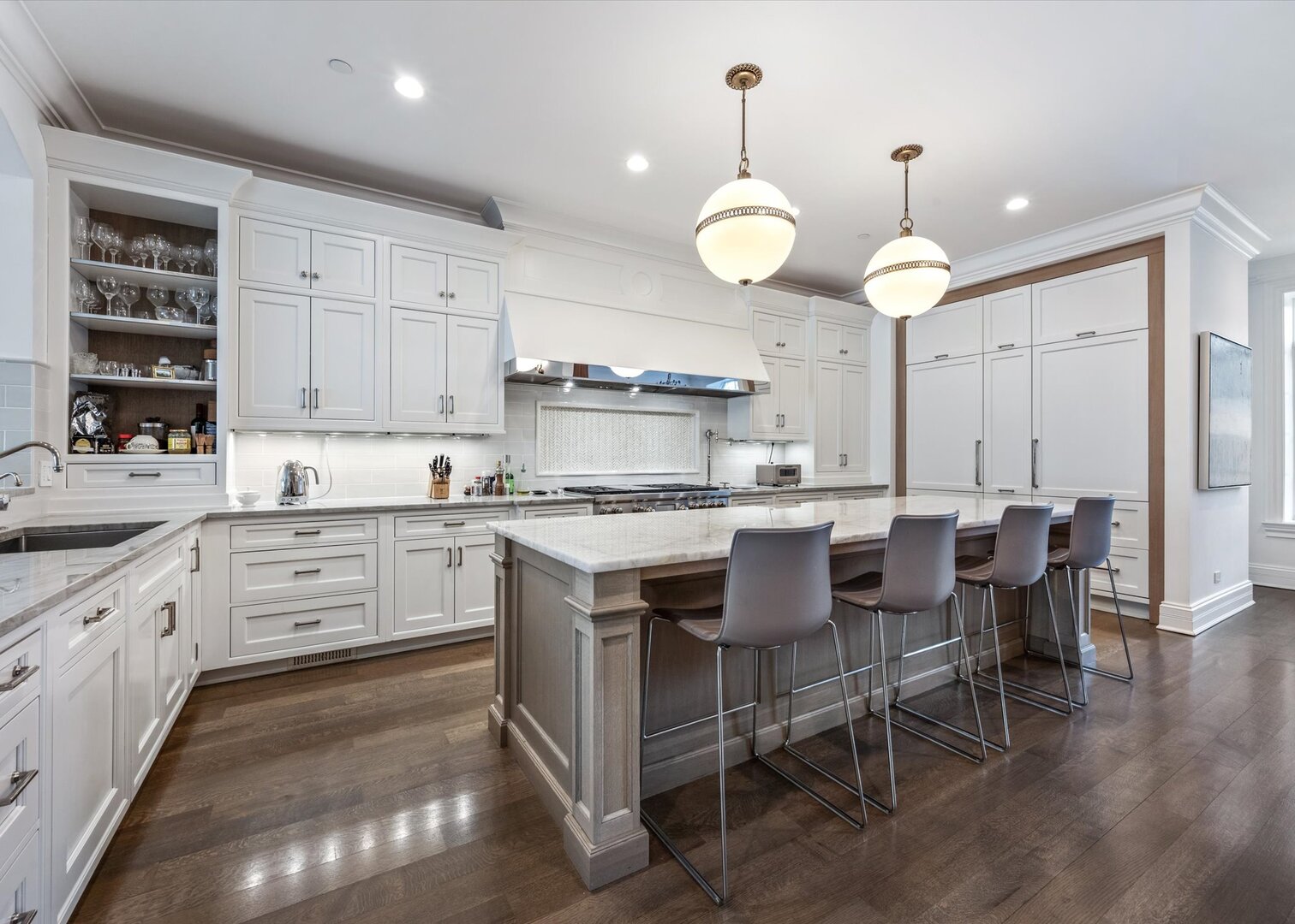 441 West Deming Place Chicago, IL 60614 - Photo 14 of 54 a kitchen with cabinets appliances and a dining table