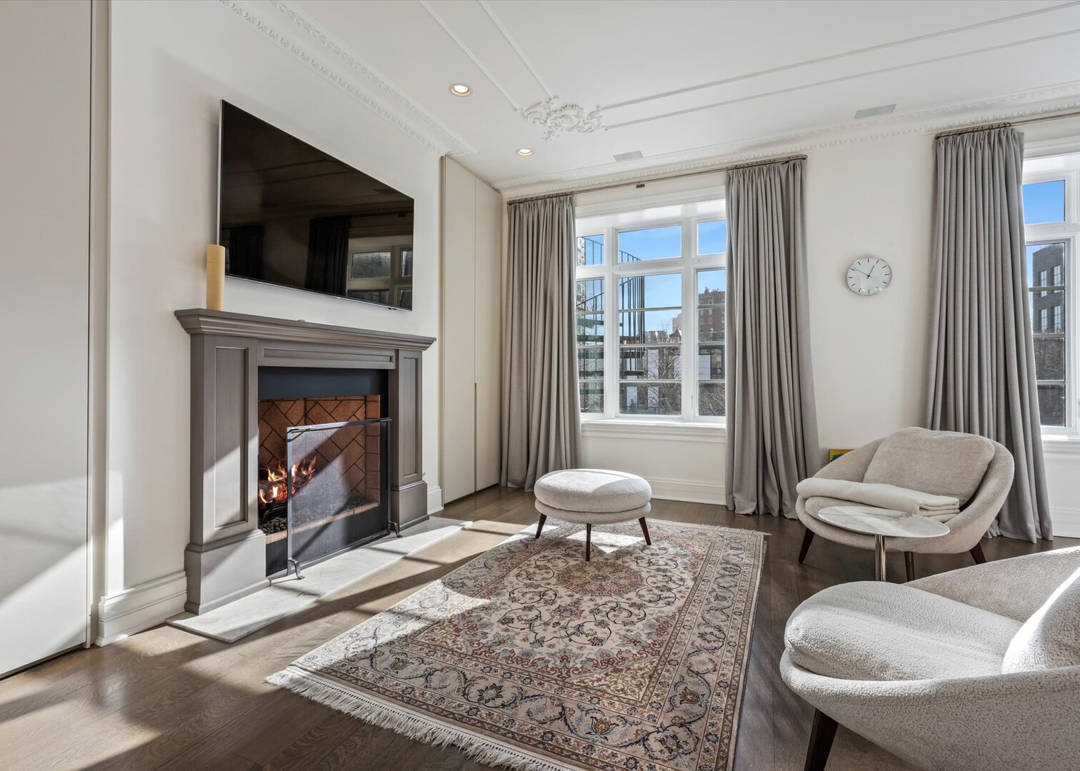 441 West Deming Place Chicago, IL 60614 - Photo 27 of 54 a living room with furniture a flat screen tv and a fireplace