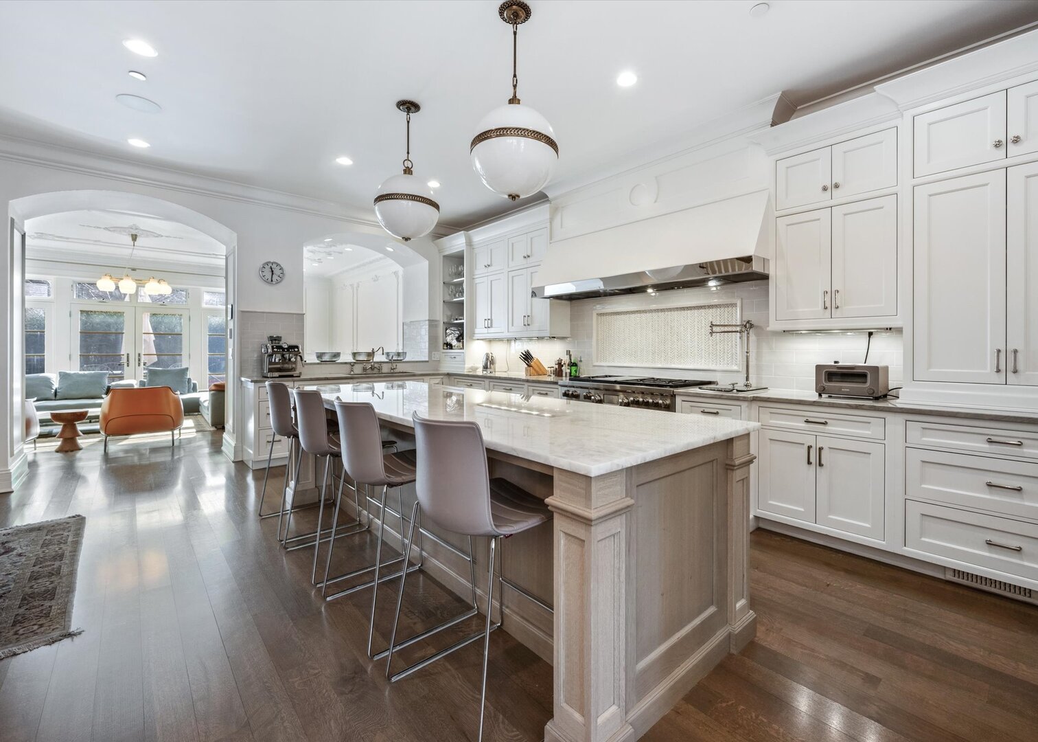 441 West Deming Place Chicago, IL 60614 - Photo 9 of 54 a kitchen with stainless steel appliances kitchen island granite countertop a table chairs and a cabinets