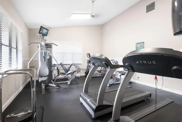 a view of a room with gym equipment