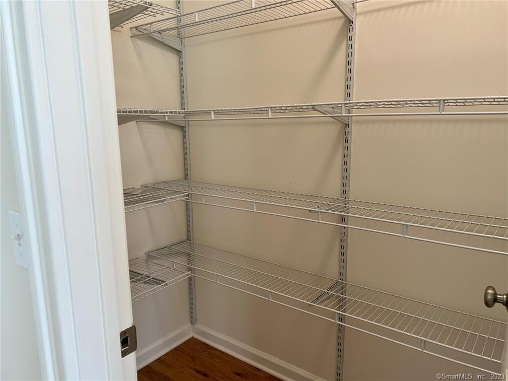 73 West Main Street, Unit 5 Clinton, CT 06413 - Photo 17 of 23 a view of an empty walk in closet