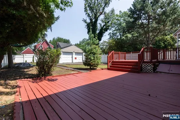 a balcony view with a hardwood floor