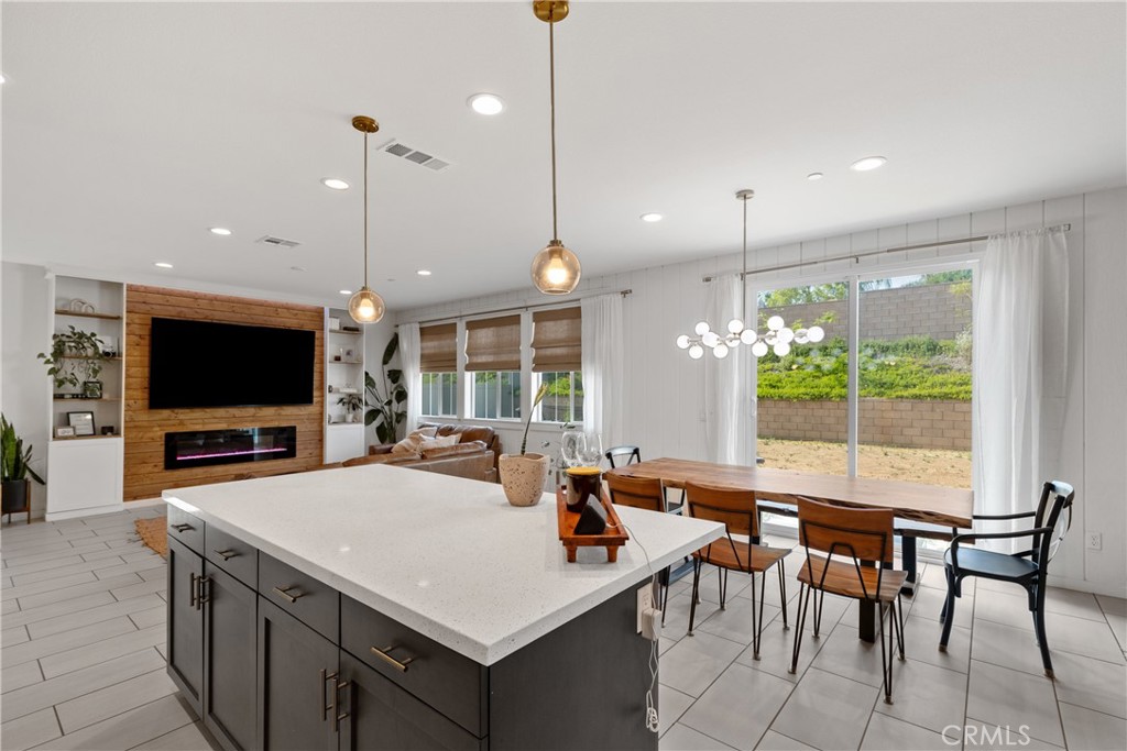 28341 Heather Grn Way Menifee, CA 92584 - Photo 44 of 44 Open floor plan from the large kitchen to the living area