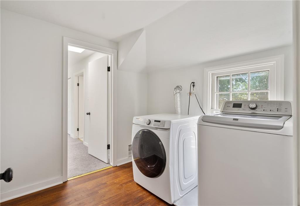 1017 McCoy Road McKees Rocks, PA 15136 - Photo 19 of 30 a view of washer and dryer with kitchen in the background
