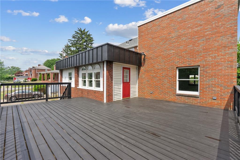 1017 McCoy Road McKees Rocks, PA 15136 - Photo 28 of 30 a view of a house with wooden deck
