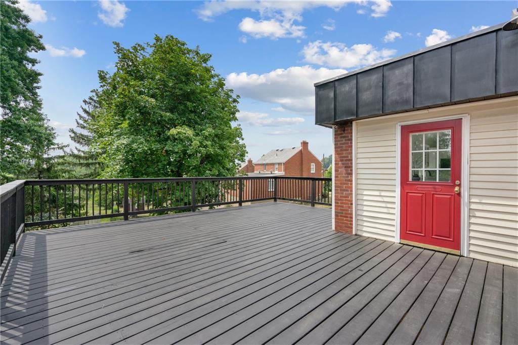 1017 McCoy Road McKees Rocks, PA 15136 - Photo 29 of 30 a view of balcony with wooden floor and fence