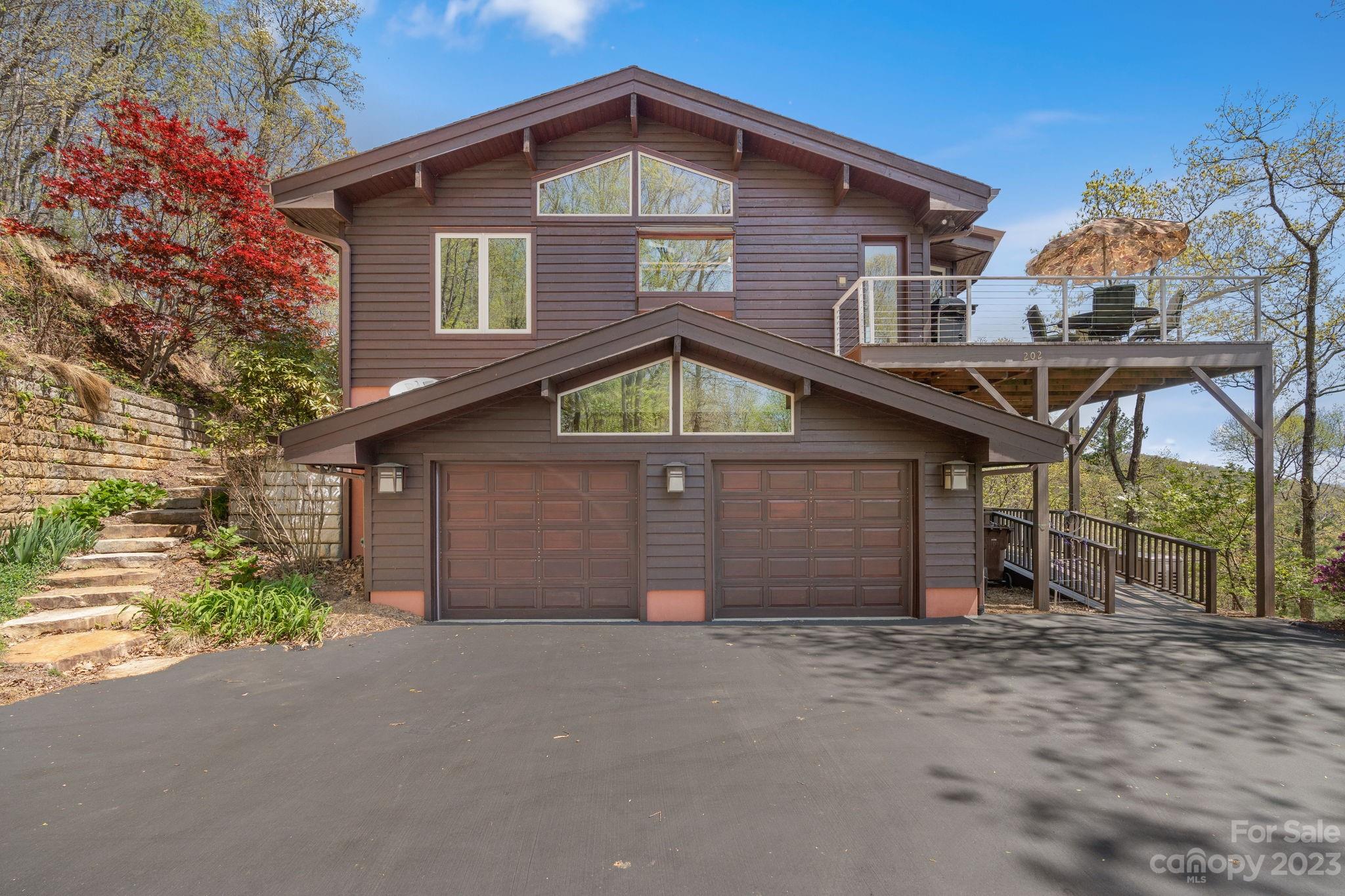 202 Mt Olive Drive Asheville, NC 28804 - Photo 2 of 48 a front view of a house