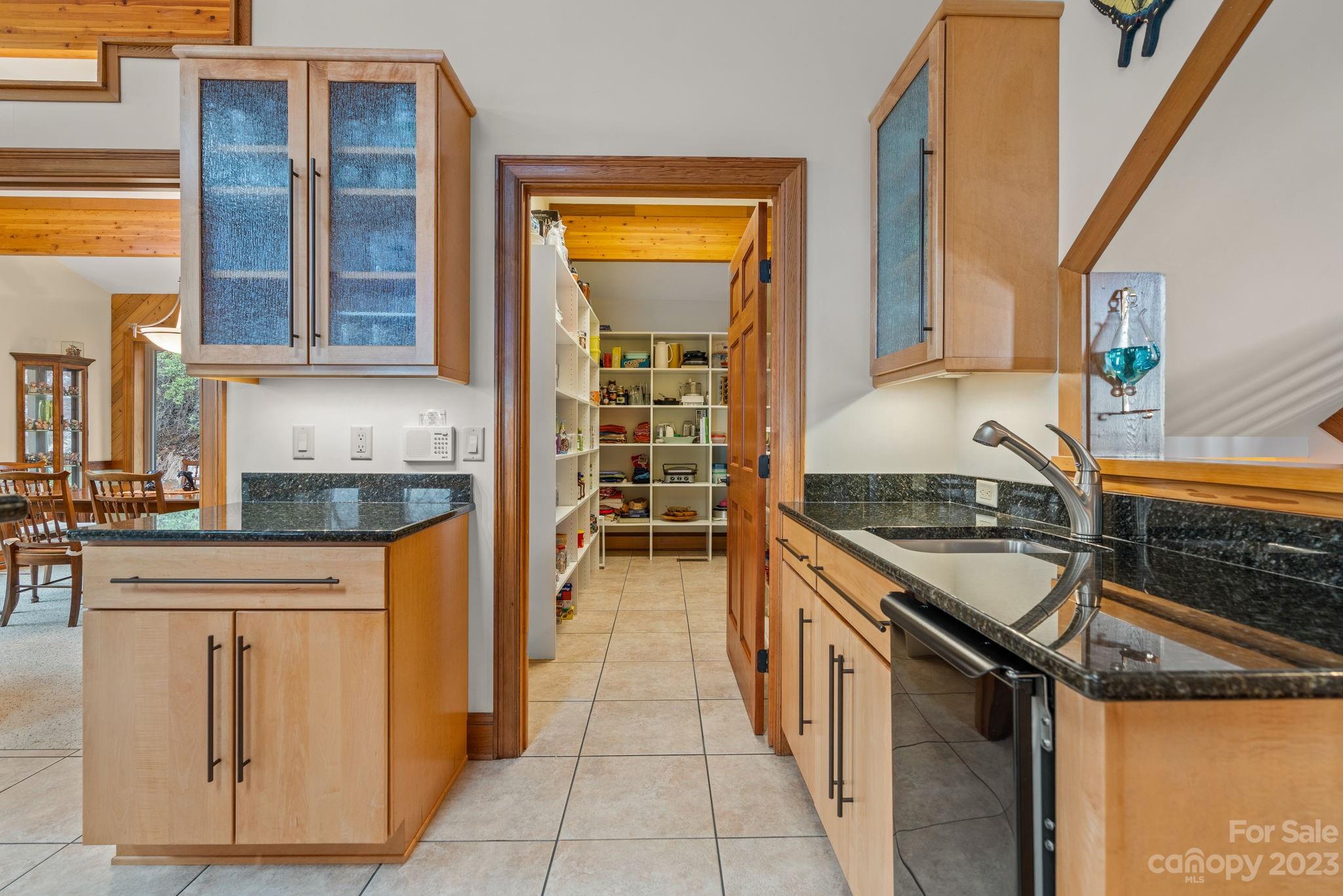 202 Mt Olive Drive Asheville, NC 28804 - Photo 23 of 48 a kitchen with stainless steel appliances granite countertop a stove and a sink