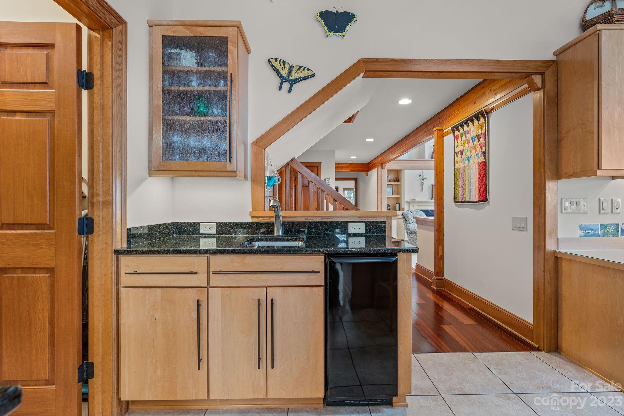 202 Mt Olive Drive Asheville, NC 28804 - Photo 24 of 48 a kitchen with stainless steel appliances granite countertop a refrigerator and a stove