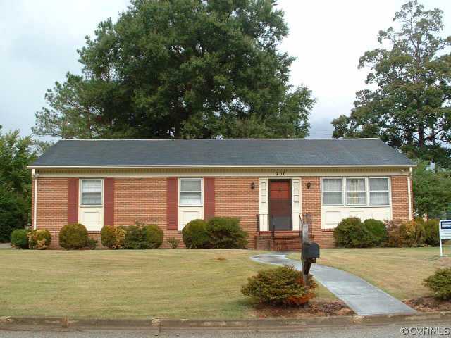 900 Yorkshire Road Colonial Heights, VA 23834 - Photo 1 of 1 a front view of house with yard and trees around