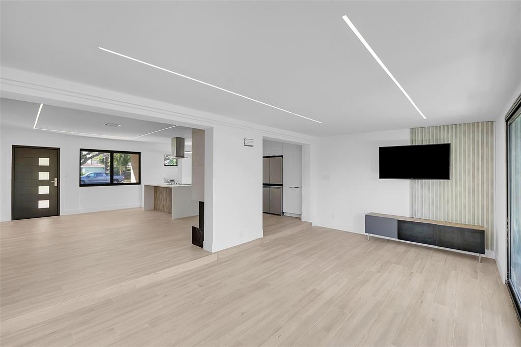 1257 Northwest 4th Street Boca Raton, FL 33486 - Photo 13 of 23 a view of a livingroom with a flat screen tv