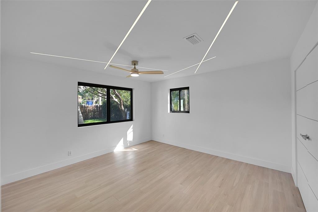 1257 Northwest 4th Street Boca Raton, FL 33486 - Photo 17 of 23 an empty room with windows