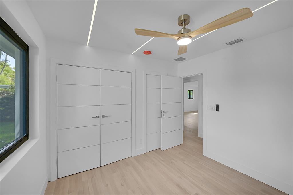 1257 Northwest 4th Street Boca Raton, FL 33486 - Photo 20 of 23 a view of an empty room with a window