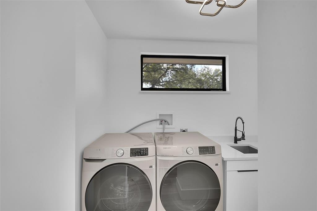 1257 Northwest 4th Street Boca Raton, FL 33486 - Photo 10 of 23 a utility room with dryer and washer