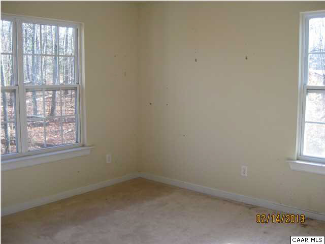 6323 Community House Road Columbia, VA 23038 - Photo 11 of 11 an empty room with a window