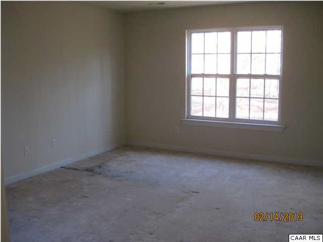 6323 Community House Road Columbia, VA 23038 - Photo 7 of 11 an empty room with a window