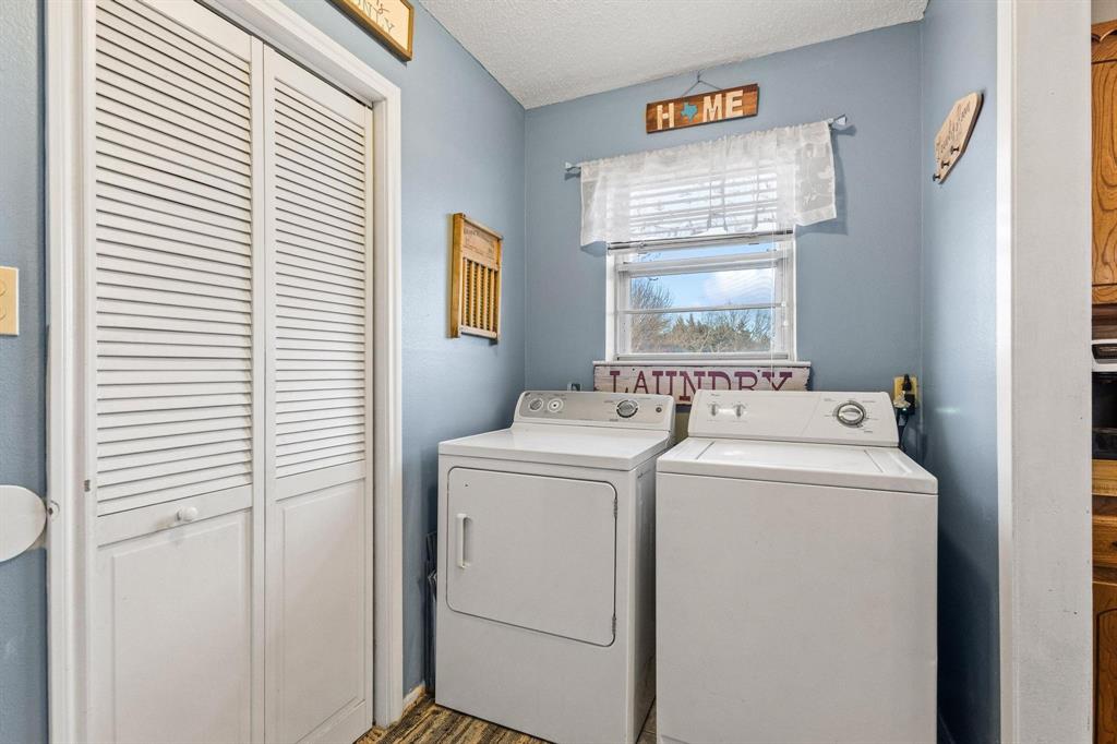 3013 Belle Avenue Denison, TX 75020 - Photo 13 of 32 a utility room with dryer and washer