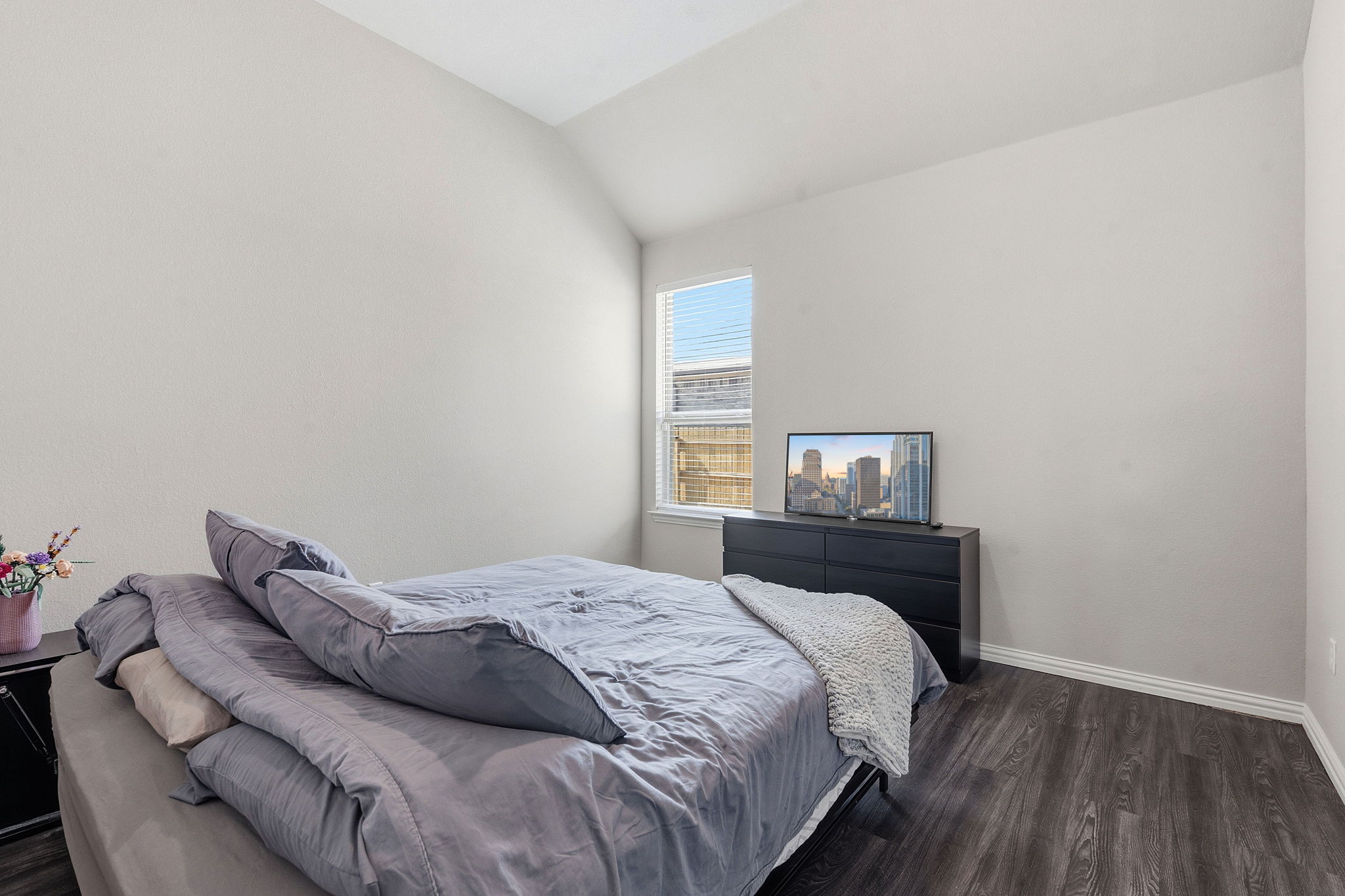 12616 Twisted Root Drive Manchaca, TX 78652 - Photo 25 of 36 The fourth bedroom comes with wood look flooring.