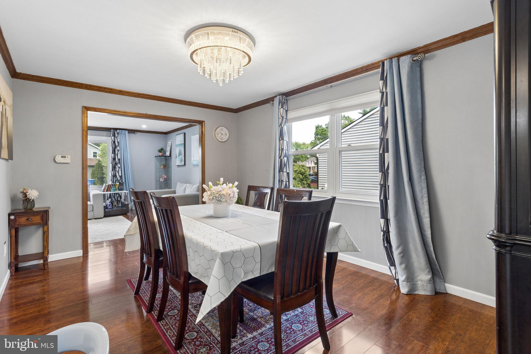 252 Sandringham Road Cherry Hill, NJ 08003 - Photo 9 of 31 a view of a dining room with furniture window and wooden floor
