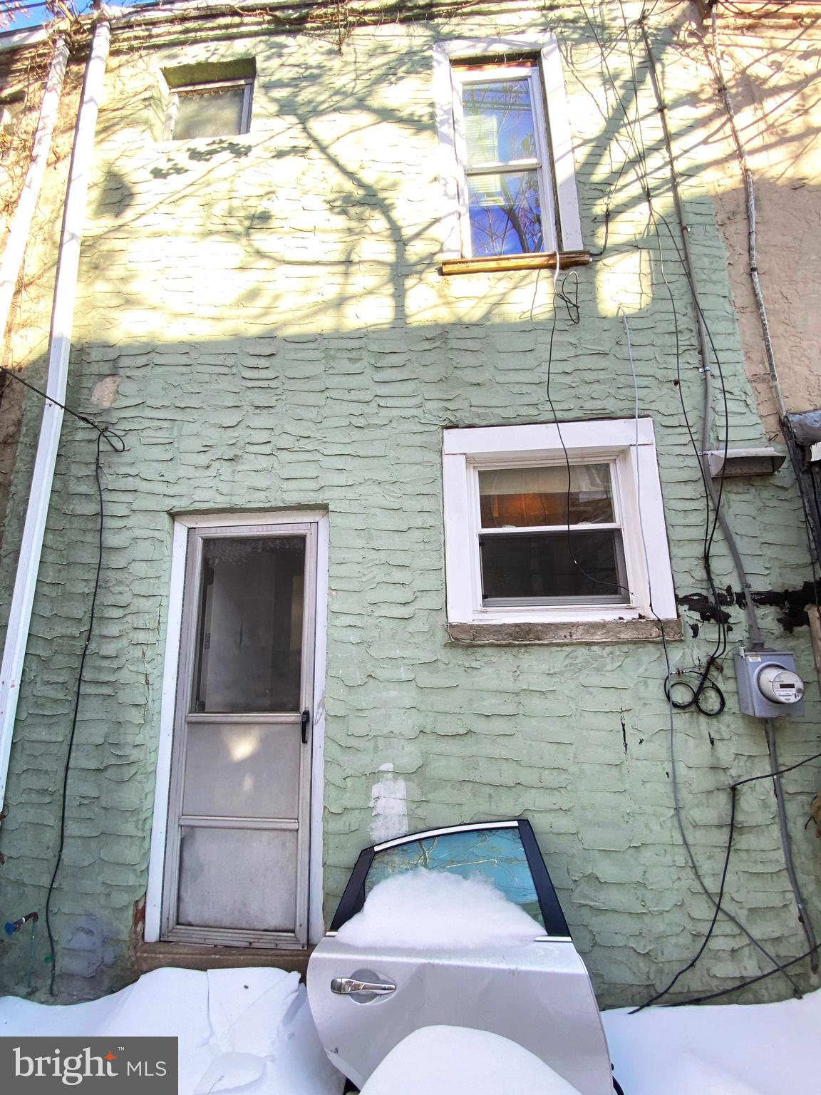 3342 Malta Street Philadelphia, PA 19134 - Photo 37 of 39 a brick house with four windows