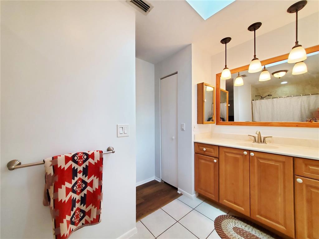 3456 Highlands Road Punta Gorda, FL 33983 - Photo 19 of 80 a bathroom with a sink and a mirror