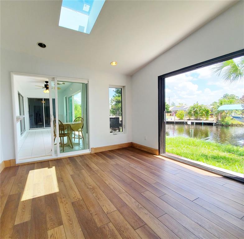 3456 Highlands Road Punta Gorda, FL 33983 - Photo 35 of 80 a view of a room with wooden floor and walls