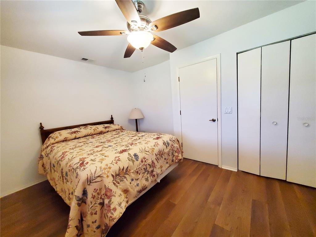 3456 Highlands Road Punta Gorda, FL 33983 - Photo 41 of 80 a bedroom with a bed and a fan