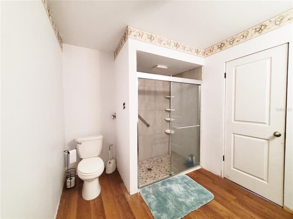 3456 Highlands Road Punta Gorda, FL 33983 - Photo 46 of 80 a bathroom with a toilet and a shower