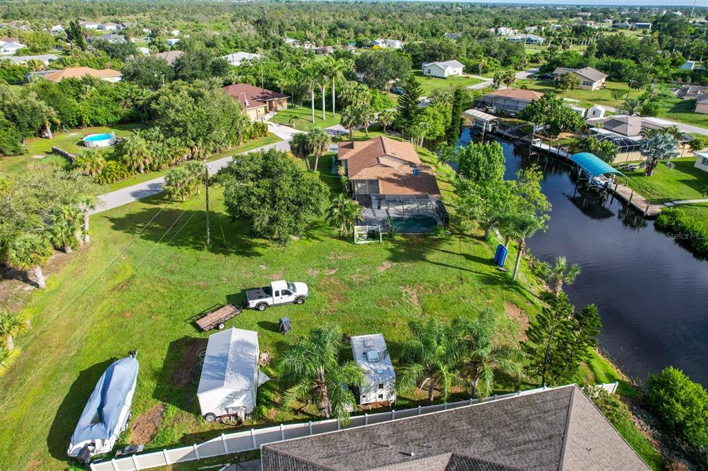 3456 Highlands Road Punta Gorda, FL 33983 - Photo 78 of 80 an aerial view of residential houses with outdoor space and swimming pool