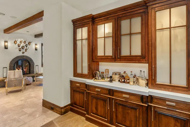 a bedroom with a large bed and a couch