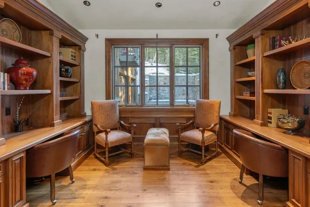 a bathroom with bathtub and window