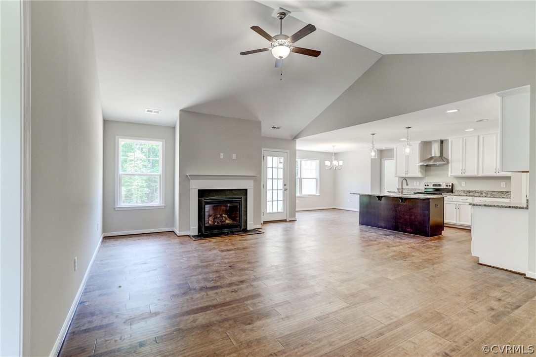 7113 Appleman Road Chesterfield, VA 23832 - Photo 6 of 22 a view of a kitchen with a stove cabinets and a fireplace