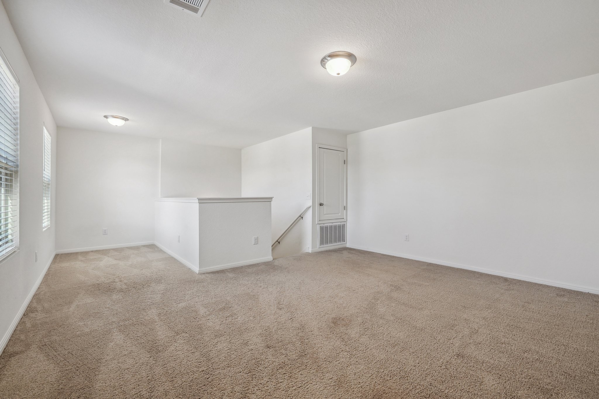 14105 Jeannette Rankin Rd Manor Manor, TX 78653 - Photo 22 of 29 Upstairs second living space with an office nook.