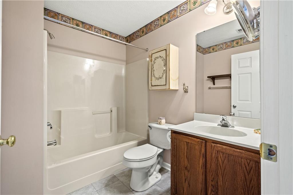 81501 Lost Valley Drive Mars, PA 16046 - Photo 25 of 25 a bathroom with a sink a toilet and shower