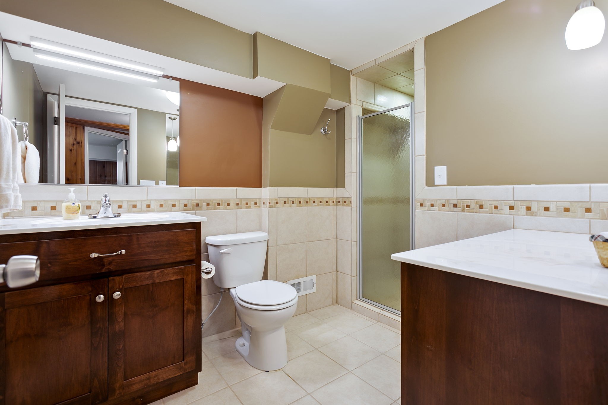 2811 Ernest Hawkins Road Columbia, TN 38401 - Photo 32 of 58 a bathroom with a sink a toilet and a mirror