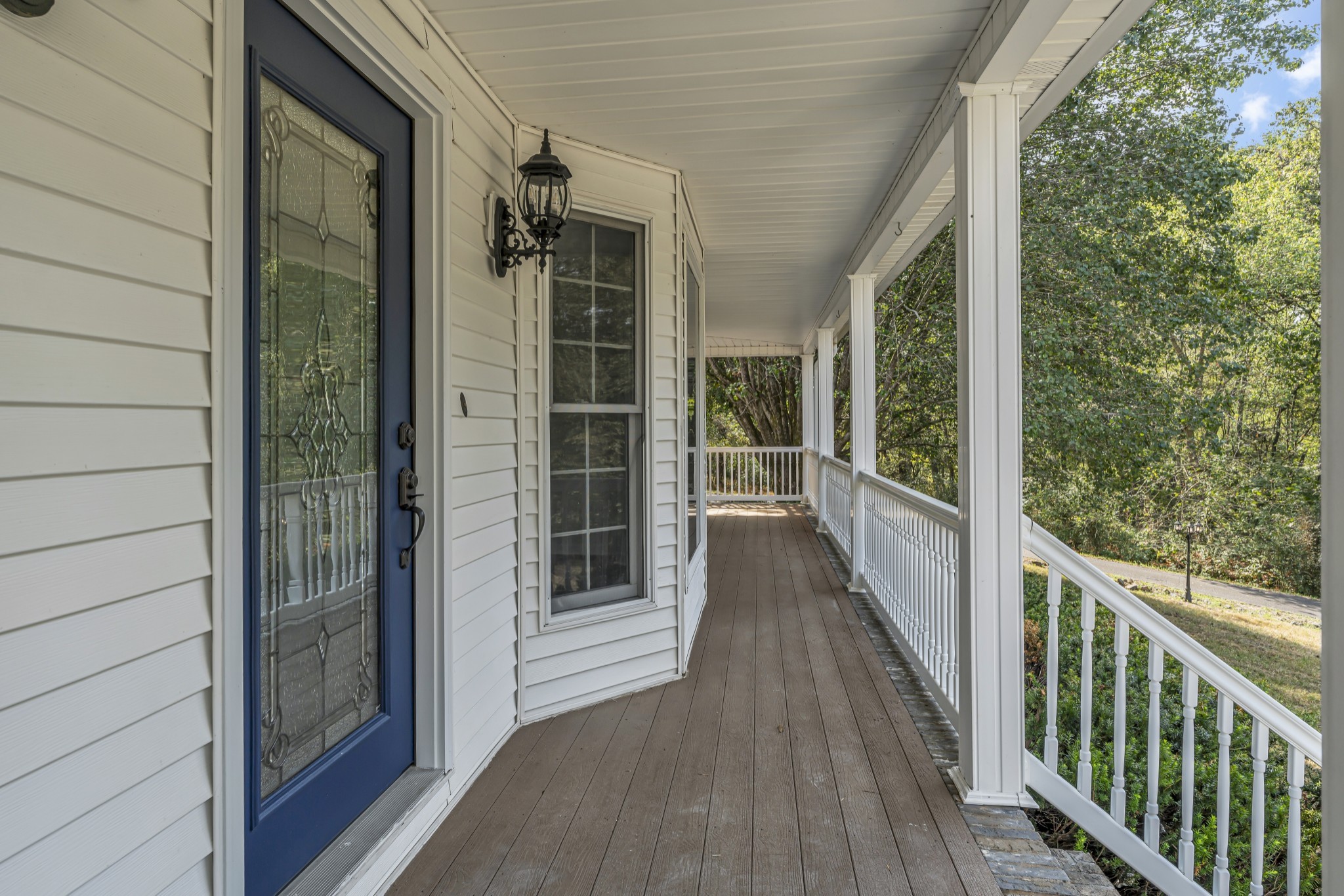6041 Henry Gower Road Pleasant View, TN 37146 - Photo 11 of 63 a view of a balcony with wooden floor