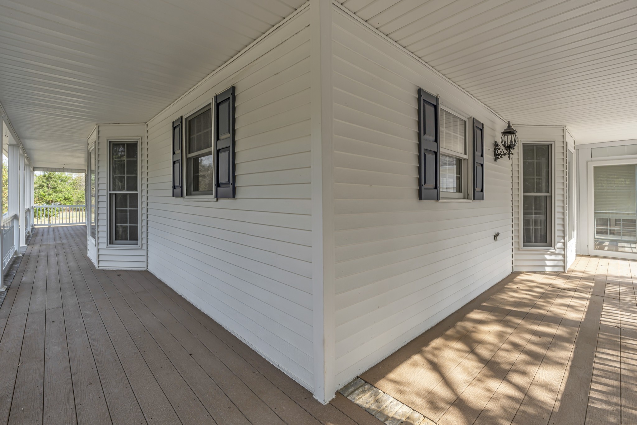 6041 Henry Gower Road Pleasant View, TN 37146 - Photo 12 of 63 a view of a house with wooden floor and a yard