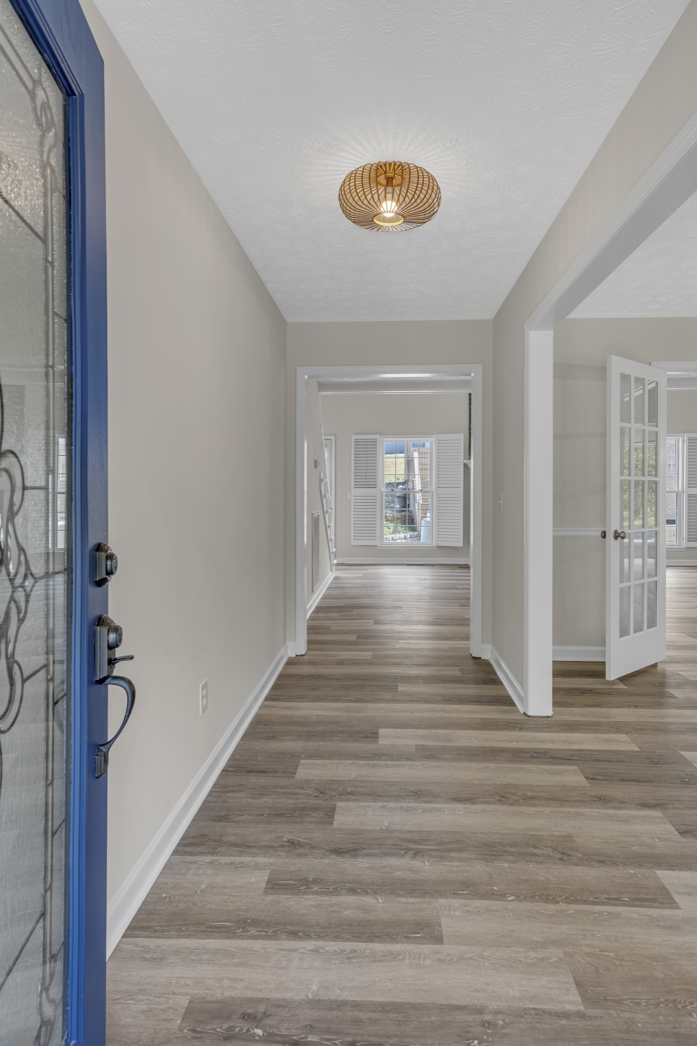 6041 Henry Gower Road Pleasant View, TN 37146 - Photo 14 of 63 a view of wooden floor and windows in a room