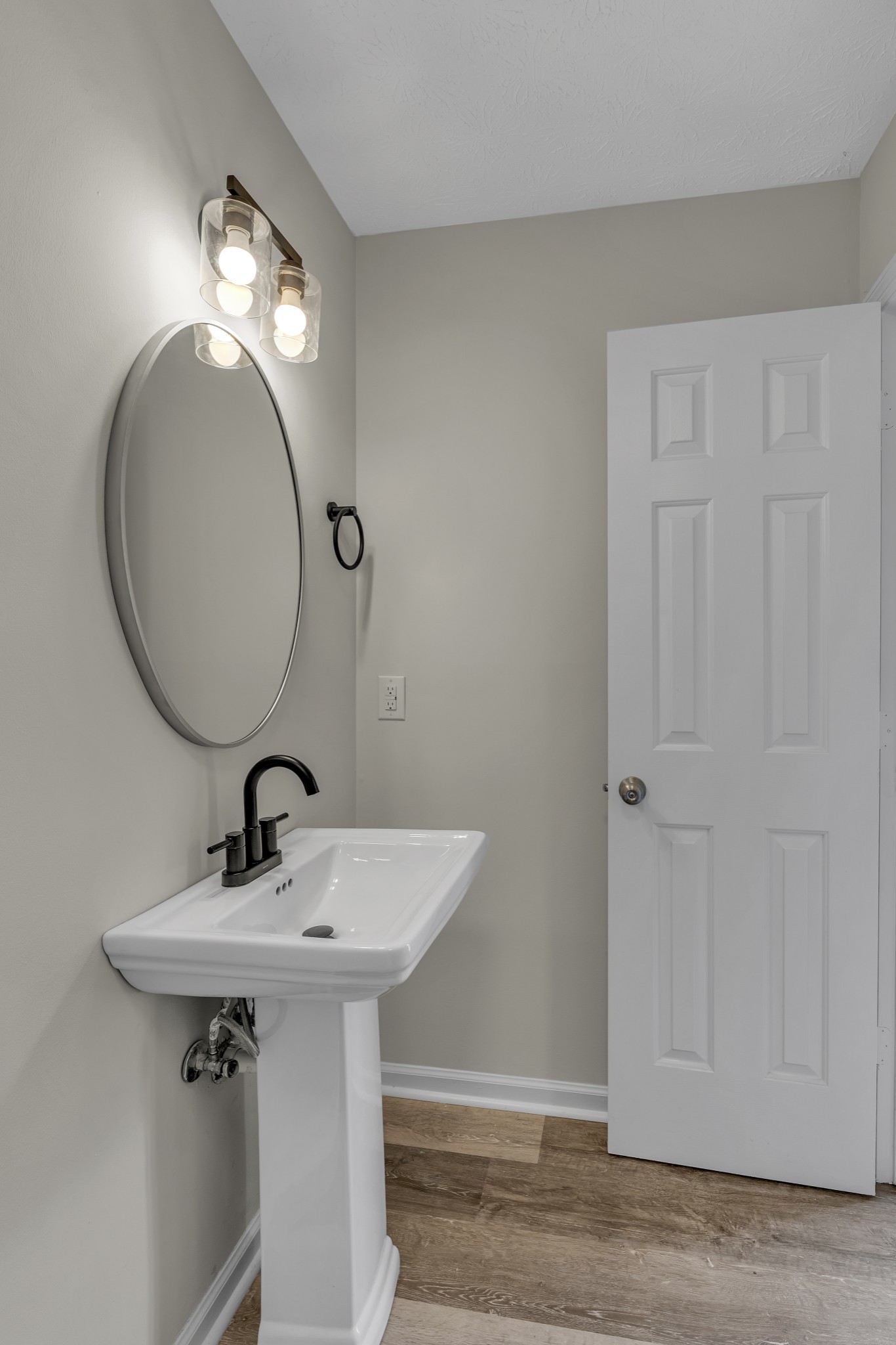 6041 Henry Gower Road Pleasant View, TN 37146 - Photo 39 of 63 a bathroom with a sink and a mirror