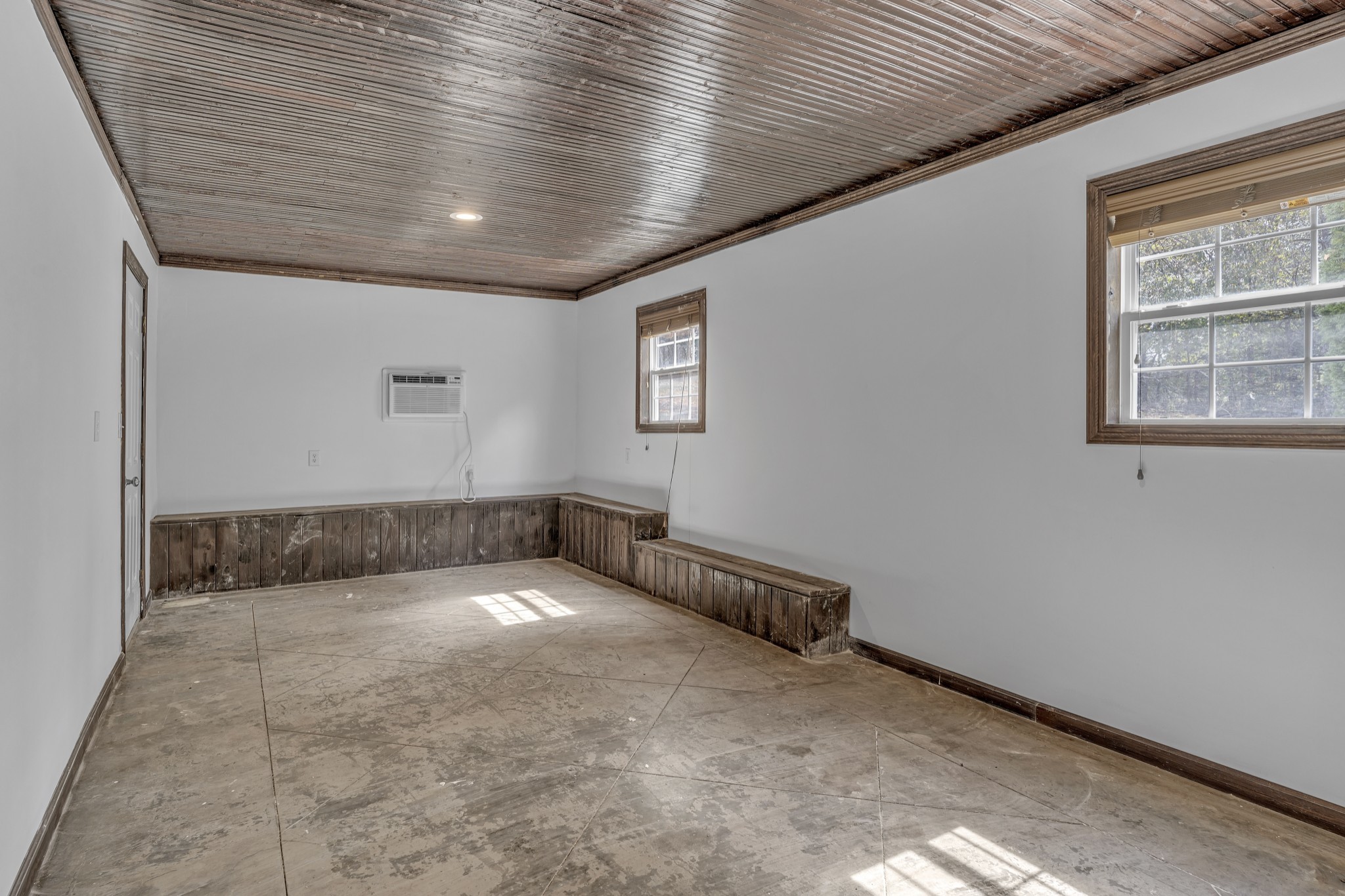 6041 Henry Gower Road Pleasant View, TN 37146 - Photo 45 of 63 a view of an empty room with windows
