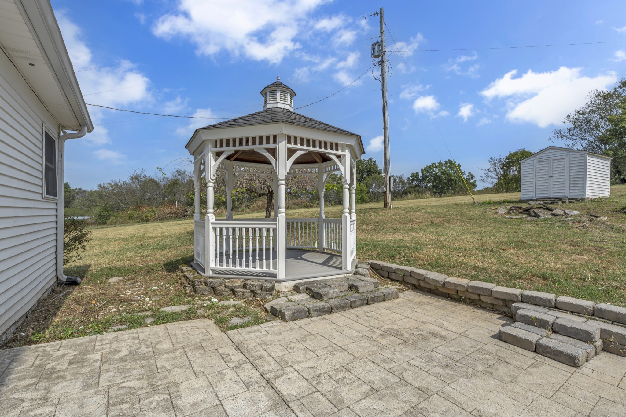 6041 Henry Gower Road Pleasant View, TN 37146 - Photo 48 of 63 a view of a house with a yard