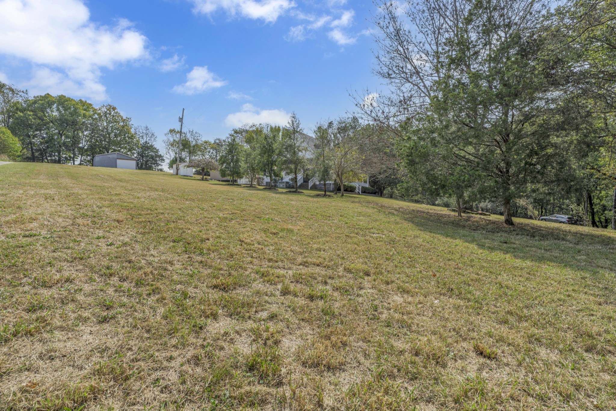 6041 Henry Gower Road Pleasant View, TN 37146 - Photo 58 of 63 a view of an outdoor space and a yard
