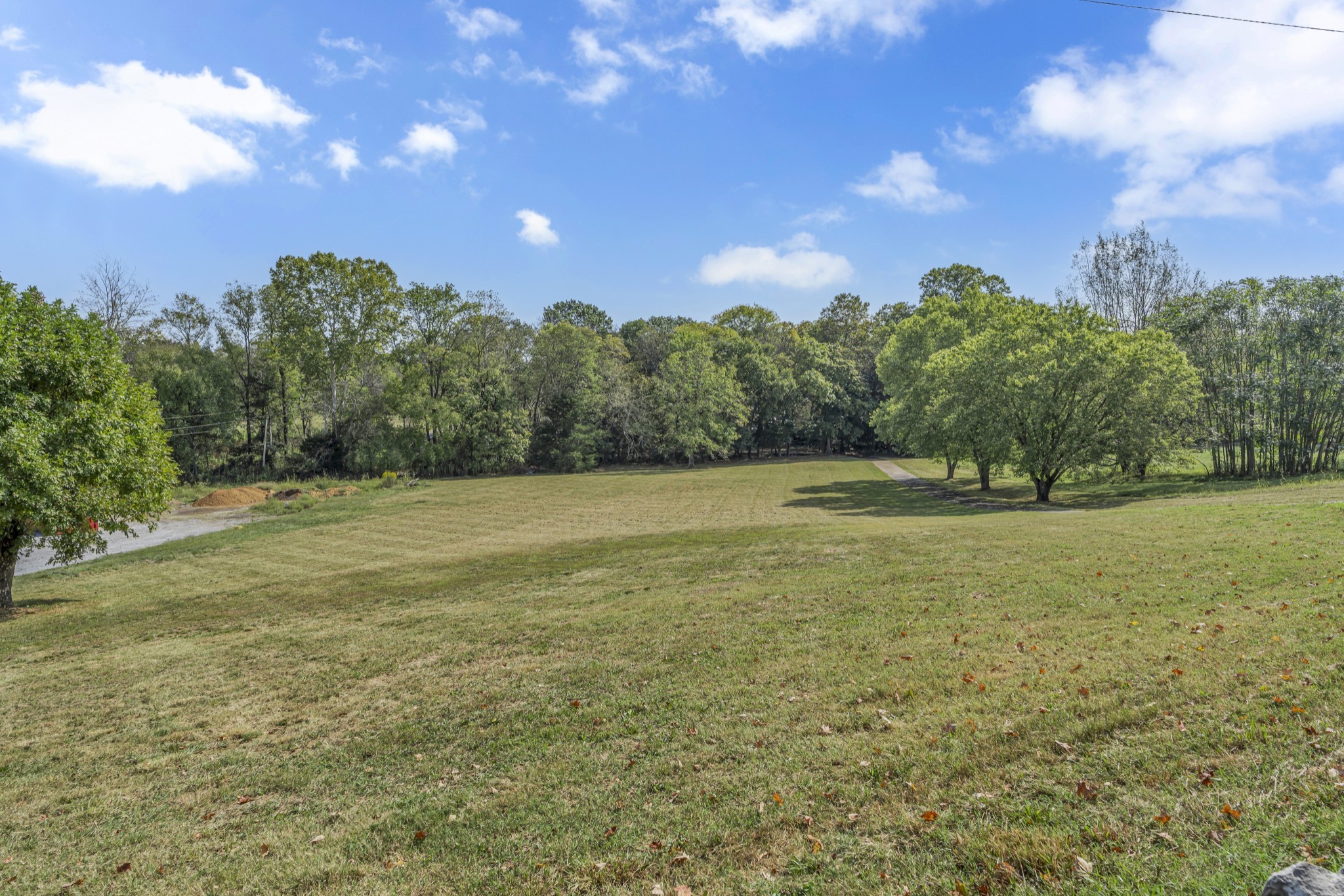 6041 Henry Gower Road Pleasant View, TN 37146 - Photo 63 of 63 a view of outdoor space with deck and yard