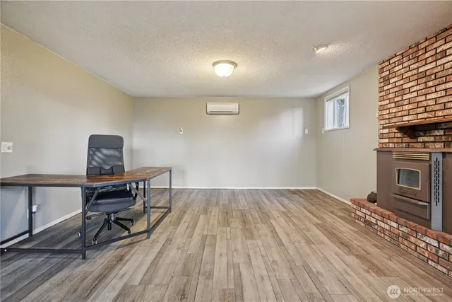 a room with furniture and a fireplace