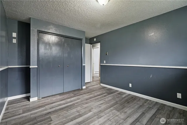a view of a balcony with wooden floor