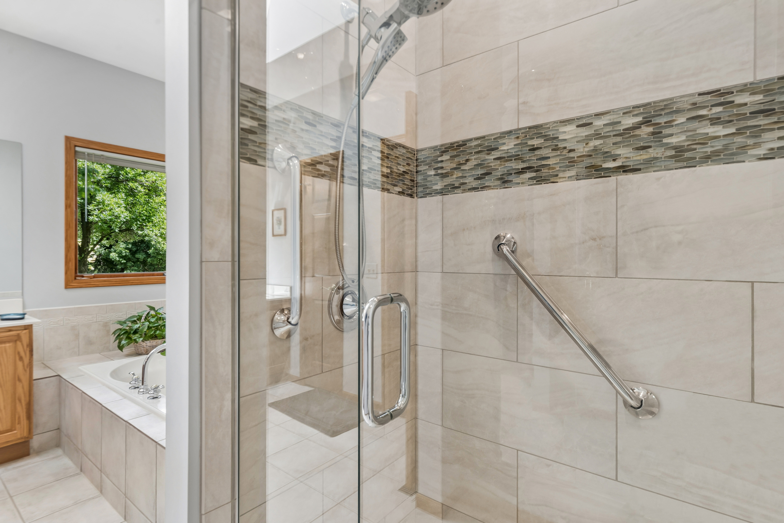 10907 Red Hawk Lane Spring Grove, IL 60071 - Photo 20 of 44 a bathroom with a shower