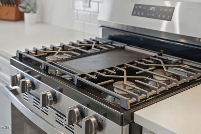 a view of a small space with wooden floor